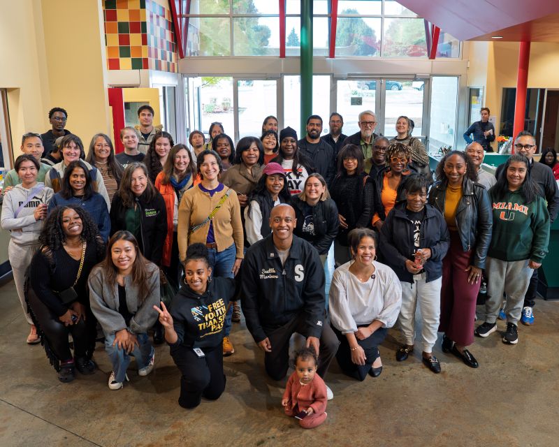 Executive Zahilay, Parks staff, and Skyway community members pose for a photo